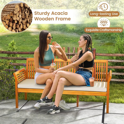 Wooden Outdoor Bench with White Cushion, Curved Armrest, and Slatted Back
