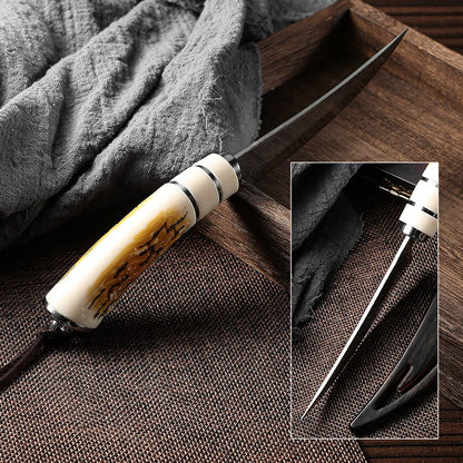Boning knife with curved blade